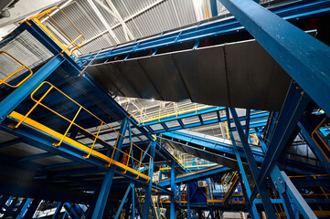 Wall Mural - Conveyor belt transports sorted litter at recycling plant