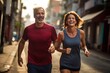 A middle-aged Brasilian couple during an evening jog through the streets of their neighborhood. Sports as the best remedy for aging. Loving middle aged couple during outdoor jogging workout