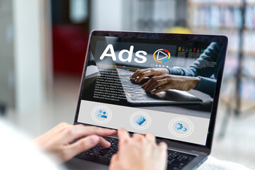 Human use laptop with advertising branding, online content, freelance, sale, working online, content creator, marketing, Ads, digital marketing, branding, E-commerce, blog online on computer at home