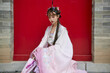 © 亮亮 徐 - An Oriental beauty in ancient attire holding an umbrella