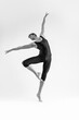 © danmorgan12 - male Ballet Dancer Young Athletic Man in Black Suit Posing in Ballanced Stretching Dance Pose Studio On White.