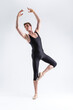 © danmorgan12 - Professional Caucasian Ballet Dancer Man Posing in Dancing Stretching Pose With Hands Lifted Up in While Standing on Feet in Black Tights
