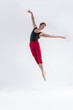 © danmorgan12 - Modern Ballet Dancer. Contemporary Art Ballet With Young Flexible Athletic Man Posing in Flying Dance Pose in Studio on White