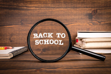 Wall Mural - Back To School Concept. Textbooks on a wooden texture table