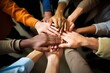 no room for racism A multiracial group hands in a circle. Created with Generative AI