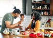 © Lumos sp - child family kitchen food boy son mother father breakfast cereal bowl morning healthy diet eating home black african american father man happy childhood cute meal preparing