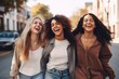 © Martin - three young woman enjoying time with friends with street background