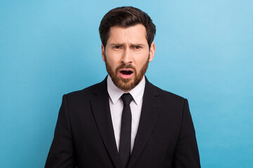 Sticker - Closeup portrait of funny young businessman confused wtf his partner staring stressed wear uniform isolated on blue color background