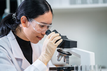 Wall Mural - closeup of scientific microscope data analysis in the laboratory, medicine equipment setting in lab 