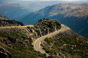 Wall Mural - Winding  serpentine road in the mountains of the Serra da Estrela or Star Mountain Range in Portugal.