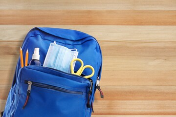 Poster - Opened colored School backpack with set of stationery