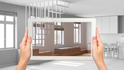 Wall Mural - augmented reality concept. hand holding tablet with ar application used to simulate furniture and de