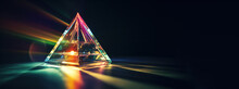 Light Refraction Crystal Prism With Abstract Blurred Colorful Lens Flare Bokeh On Black Background. Light Refraction Wide Web Banner