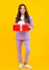 Poster - Teenager kid with present box. Teen child girl giving birthday gift. Present, greeting and gifting concept.