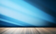 © GustavsMD - Versatile backdrop for design and product presentation with blue wall, light reflections and wooden floor