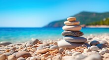 A Stack Of Stones On The Ocean At Sunset. Pyramid Of Pebbles On The Beach. The Concept Of Balance, Harmony, Meditation, Rest Or Seaside Vacation. Illustration For Cover, Card, Interior Design Or Print