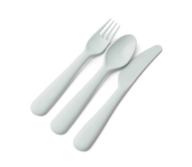 Wall Mural - Plastic eating utensils for baby on white background