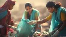 A Group Of Women Are Using Gloves To Pick Up Trash