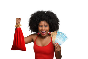 a woman holds shopping bags and Brazilian money, a teenage girl smiles and looks at the camera, wearing a red dress aga