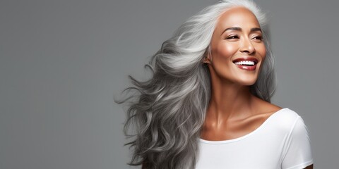 Wall Mural - Older black woman with gray hair beauty photoshoot with copy space