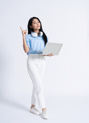 Wall Mural - Photo of young Asian girl on white background