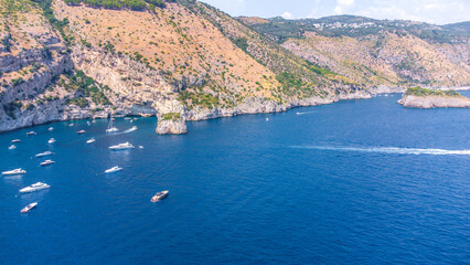 Wall Mural - The Amalfi Coast is a breathtaking stretch of coastline in southern Italy, known for its vertiginous cliffs adorned with colorful villages, turquoise waters, and lush terraced gardens. Its beauty capt