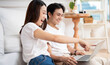 © Timeimage - Photo of young Asian couple at home