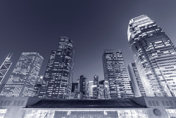 Aufkleber - Modern office building and skyline of Hong Kong City at dusk