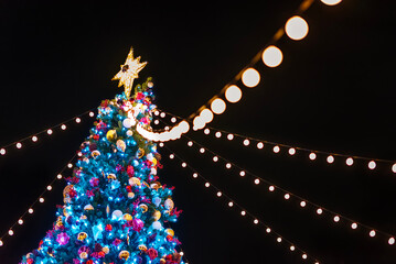 Night scenery of illuminated LED Christmas tree in park