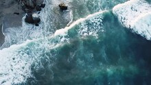 Drone View Of Big Waves Rushing To The Shore
