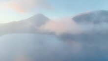 Mount Fuji On A Foggy Morning In Japan, Tranquil Beautiful Landscape Of Famous Japanese Tourist Landmark, Fujiyama Mountain Drone View