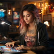 © AVishka - Young woman working on laptop. Girl with tattoo, designer freelancer, student work on computer laptop at table, tattoo artist