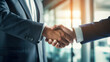 © EmmaStock - Close-up of Indian businessman handshake