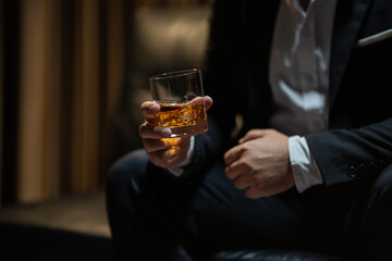 Wall Mural - Businessmen in suits drinking  Celebrate whiskey