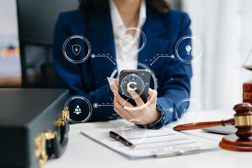 Wall Mural - Copyright or patent concept, Person hand using laptop computer, tablet and smartphone with virtual screen copyright icon trademark, Creation ownership against piracy. at office.