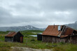 Norwegian Mountain Landscape with Damaged Building and Majestic Mountain in Scenic Nature of Haukelifjell by road E134.