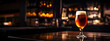 © AngrySun - Snifter glass of light beer on bar table in a dark pub with copy space. Generative AI