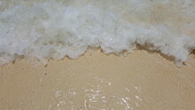 Closeup Soft Waves Crash On The White Beach On Koh Rok. Thailand