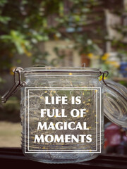 Wall Mural - Motivational and inspirational wording. Life Is Full Of Magical Moments written on blurred styled background.
