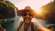 © Keitma - Selfie picture of an handsome tourist visiting national park in front of beautiful waterfall , happy man traveler with a hat and sunglasses enjoying freedom in the nature and sunset