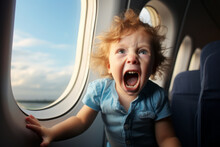 Toodler Boy Having A Temper Tantrum While Sitting By Airplane Window. Angry Child Screaming And Crying In Aircraft Cabin. Travelling With Small Kids. Flying With Children.