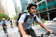 © Yuliia - Successful young japanese stylish businessman male man student costume going office work school university by bike bicycle morning city road. Healthy ecology lifestyle cycling transport bicyclist