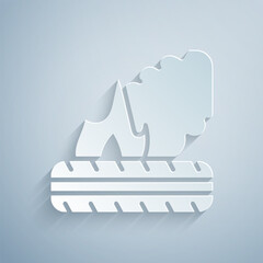 Sticker - Paper cut Lying burning tires icon isolated on grey background. Paper art style. Vector