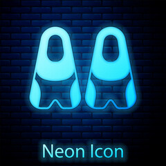 Wall Mural - Glowing neon Rubber flippers for swimming icon isolated on brick wall background. Diving equipment. Extreme sport. Diving underwater equipment. Vector