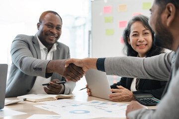 Wall Mural - Multi ethnic business people diverse handshake, Successful businessmen handshaking after good deal. Business Finishing up meeting contract concept.