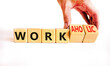 © Dzmitry - Work or workaholic symbol. Concept words Work or Workaholic on wooden cubes. Beautiful white table white background. Businessman hand. Business work or workaholic concept. Copy space.