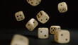 © j_everton - White Dice Floating in the Air on Dark Background 3D illustration