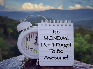 Wall Mural - Motivational and inspirational wording. It’s Monday Don’t Forget To Be Awesome written on a notepad. With blurred styled background.