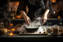 Woman Prepares Dish To Celebrate Halloween. Female Hands Cooking In Kitchen With Halloween Ingredients On Table