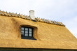 New thatch roof over house with dormer window in Denmark, thatched roof, white chimney